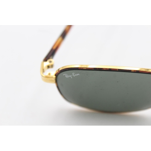 738 - A vintage cased pair of Bausch & Lomb Ray-Ban tortoiseshell effect rectangular sunglasses