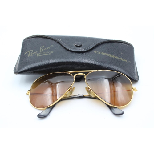 744 - A cased pair of vintage Bausch & Lomb Ray-Ban gold tone Aviator sunglasses