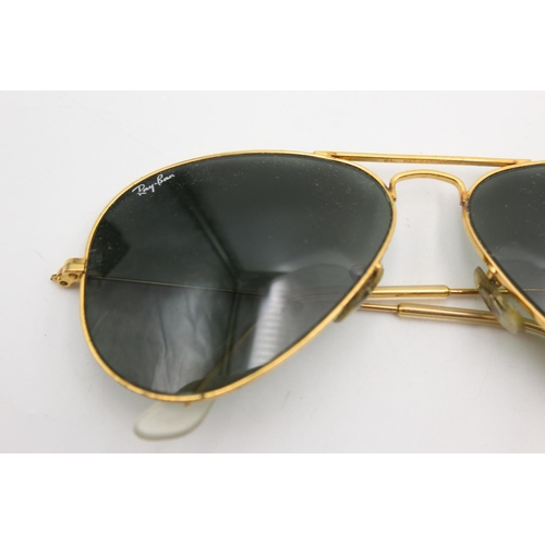 745 - A cased pair of vintage Bausch & Lomb Ray-Ban gold tone Aviator sunglasses