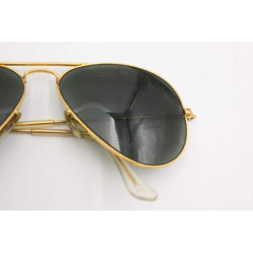 745 - A cased pair of vintage Bausch & Lomb Ray-Ban gold tone Aviator sunglasses