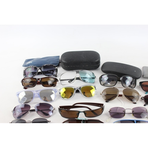 753 - A large collection of assorted sunglasses to include Miss Sixty, Roxy, Fabris Lane etc.