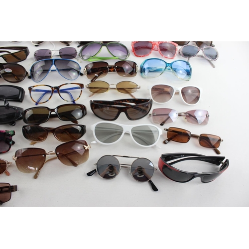 753 - A large collection of assorted sunglasses to include Miss Sixty, Roxy, Fabris Lane etc.