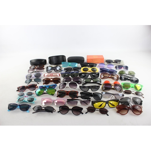 755 - A large collection of assorted sunglasses to include Hackett, Karen Millen, Police etc.