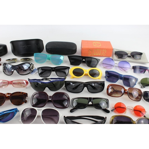 755 - A large collection of assorted sunglasses to include Hackett, Karen Millen, Police etc.