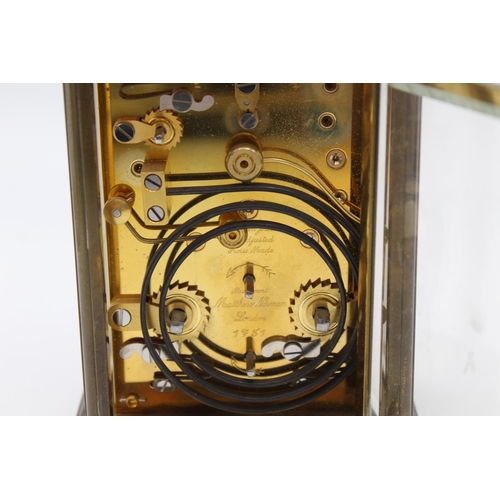 801 - A vintage Matthew Norman heavy brass cased key wind carriage clock with Swiss made 11 jewel movement... 