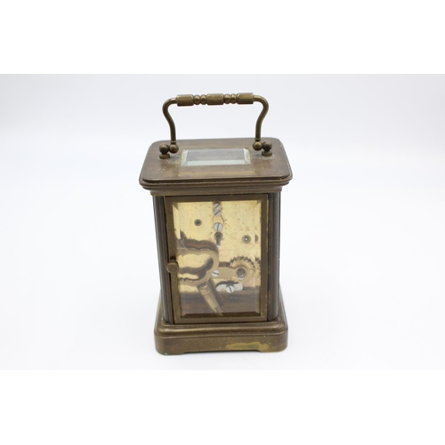 802 - A vintage Matthew Norman heavy brass cased  key wind carriage clock with eleven jewel movement