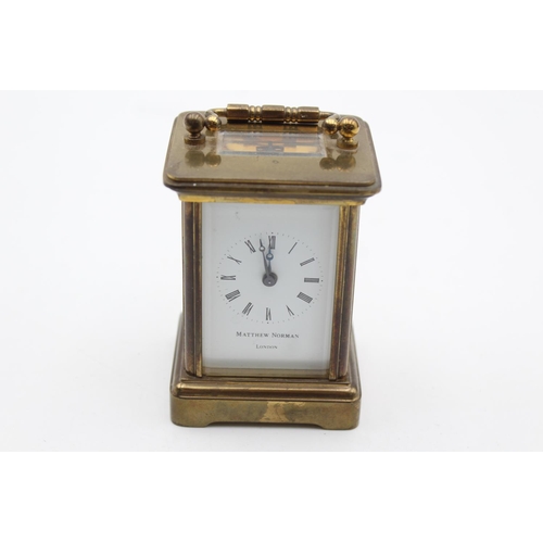 804 - A vintage Matthew Norman small brass cased key wind carriage clock with key - approx. 6cm x 5cm x 8c... 