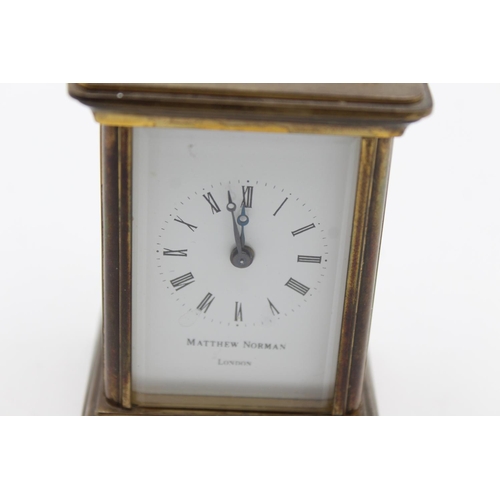 804 - A vintage Matthew Norman small brass cased key wind carriage clock with key - approx. 6cm x 5cm x 8c... 