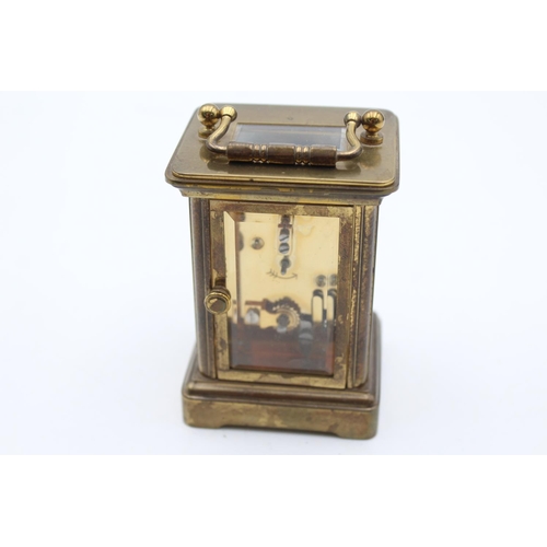 804 - A vintage Matthew Norman small brass cased key wind carriage clock with key - approx. 6cm x 5cm x 8c... 