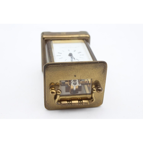 804 - A vintage Matthew Norman small brass cased key wind carriage clock with key - approx. 6cm x 5cm x 8c... 