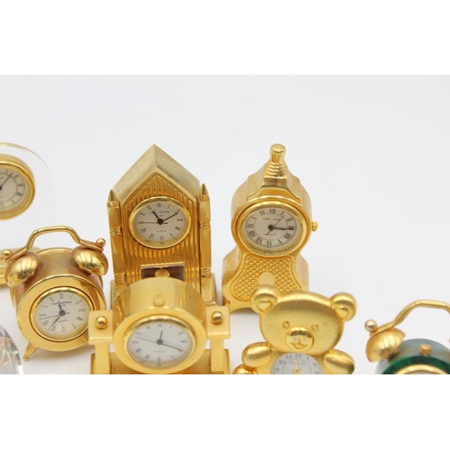 805 - Twelve assorted collectors/novelty miniature quartz clocks to include teddy bear, Cathedral etc.