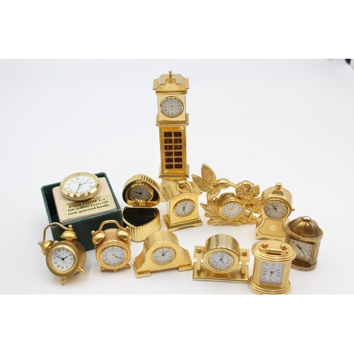 806 - Twelve assorted collectors/novelty miniature quartz clocks to include heart trinket box, Humming Bir... 