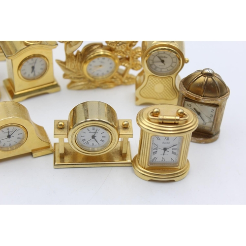 806 - Twelve assorted collectors/novelty miniature quartz clocks to include heart trinket box, Humming Bir... 