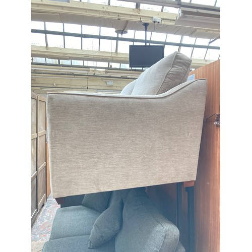 1154 - A modern light grey upholstered two seater sofa with Union Jack label to reverse - approx. 88cm high... 