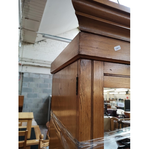 1099 - An early 20th century oak wardrobe - approx. 211cm high x 118cm wide x 53cm deep