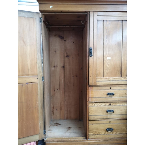 1099 - An early 20th century oak wardrobe - approx. 211cm high x 118cm wide x 53cm deep