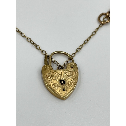 2326 - A hallmarked 9ct gold bracelet with 9ct gold heart shaped padlock clasp - approx. gross weight 4.27 ... 