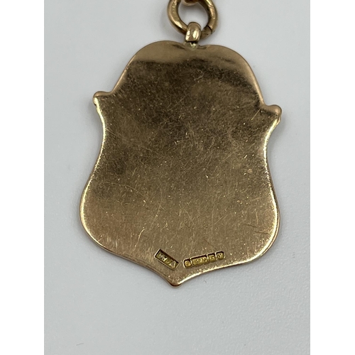 2321 - A stamped 9ct gold albert chain with hallmarked Birmingham 9ct gold fob - approx. gross weight 50 gr... 