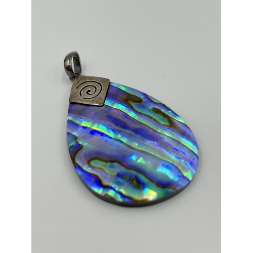 2328 - Two 925 silver abalone shell and plastic pendants - approx. gross weight 15.3 grams