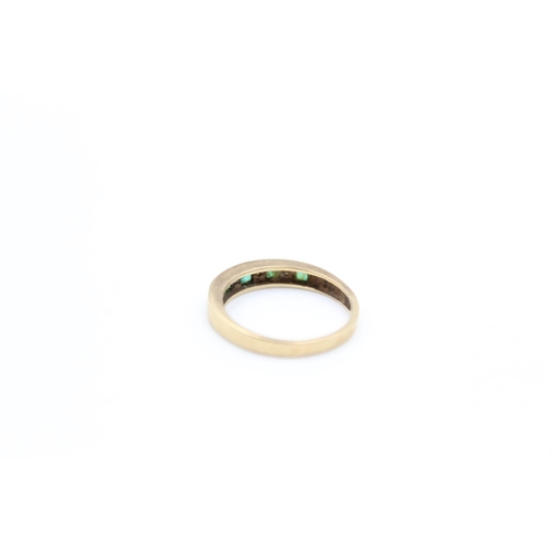 2352 - A 9ct gold emerald and diamond half eternity ring, size L - approx. gross weight 1.8 grams