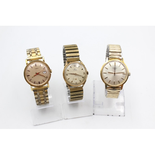 2438 - Three vintage gold tone hand wind men's wristwatches to include Rotary, Avia etc.