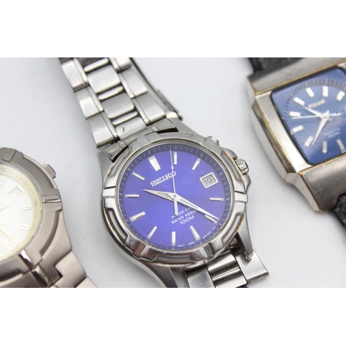 2452 - Four kinetic/solar powered men's wristwatches to include Seiko, Pulsar etc.