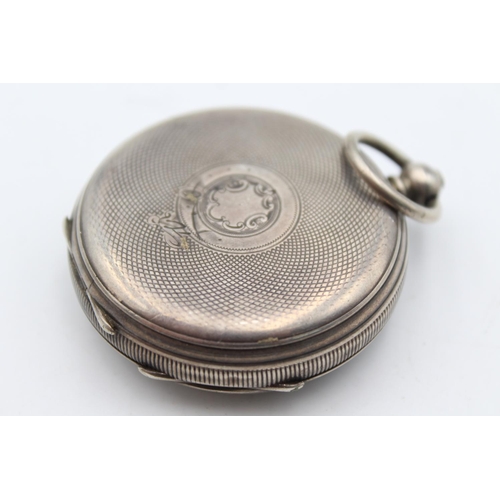 2456 - A vintage hallmarked silver cased key wind open face pocket watch