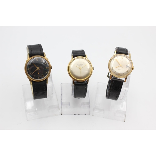 2464 - Three vintage gold tone hand wind men's wristwatches to include Fleurier, Timex etc.