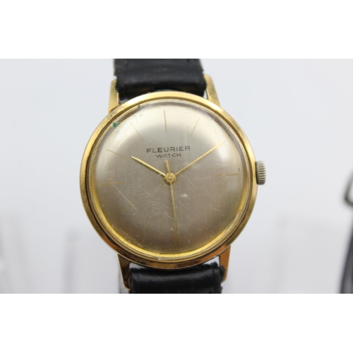 2464 - Three vintage gold tone hand wind men's wristwatches to include Fleurier, Timex etc.