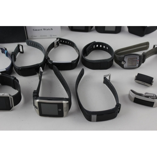 1453 - Twenty assorted unisex fitness/smart watches to include Fitbit, Polar, Max Buzz etc.