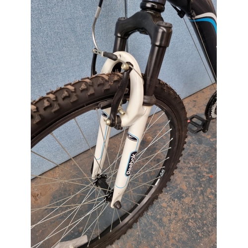 A Reebok Switchback 20 mountain bike