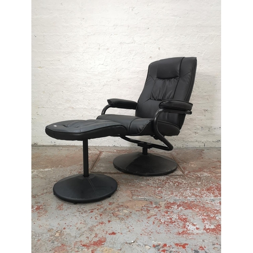 1055A - A Birlea black leatherette swivel reclining armchair with matching footstool - approx. 96cm high x 6... 