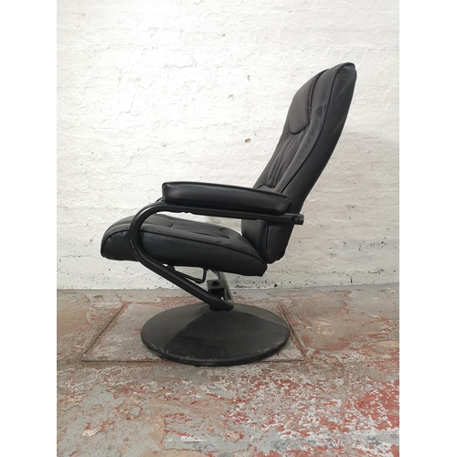 1055A - A Birlea black leatherette swivel reclining armchair with matching footstool - approx. 96cm high x 6... 