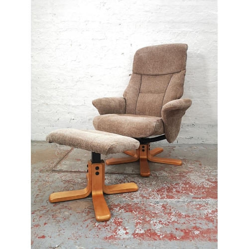 1057C - A Global Furniture Alliance Ltd. brown upholstered swivel armchair with matching footstool - approx.... 