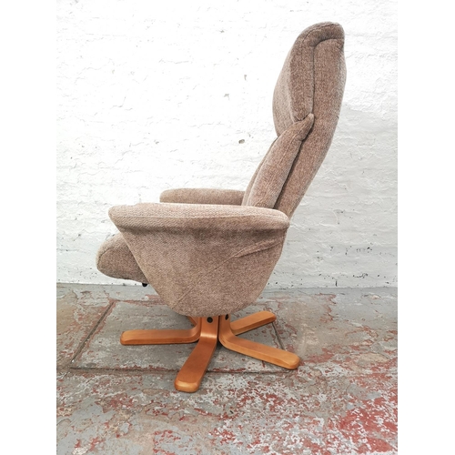 1057D - A Global Furniture Alliance Ltd. brown upholstered swivel armchair with matching footstool - approx.... 