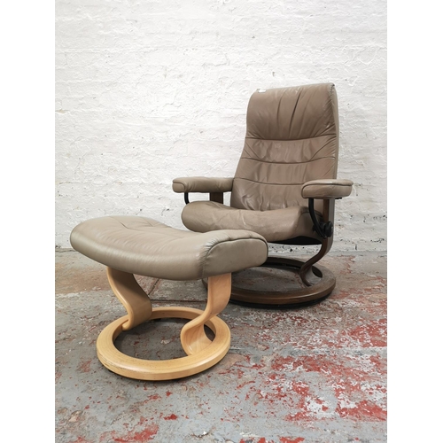 1072B - An Ekornes Stressless light brown leather armchair with stool - approx. 98cm high x 75cm wide x 62cm... 