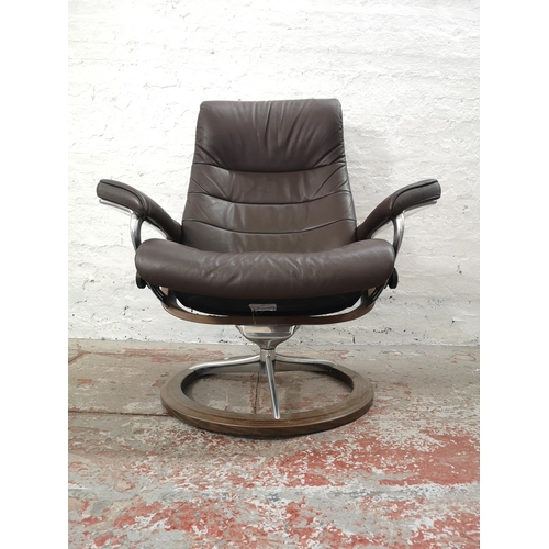 1072C - An Ekornes Stressless brown leather armchair - approx. 102cm high x 85cm wide x 62cm deep