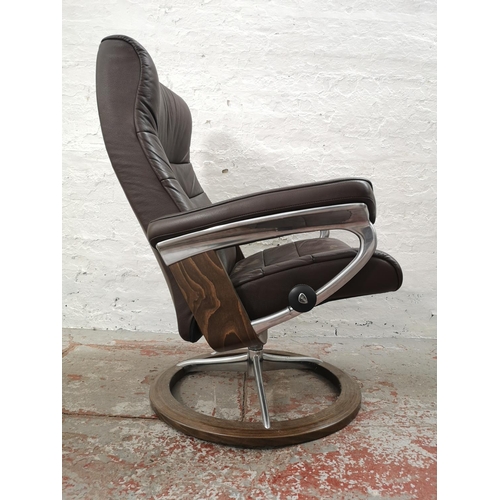 1072C - An Ekornes Stressless brown leather armchair - approx. 102cm high x 85cm wide x 62cm deep