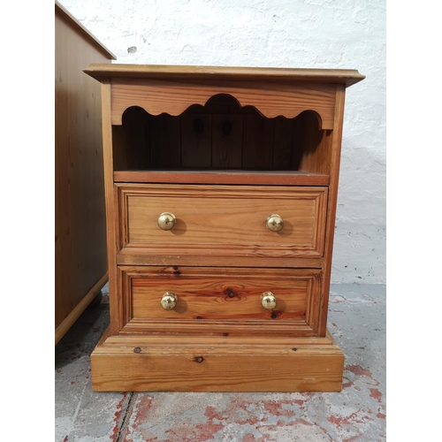 1073A - Two modern bedside cabinets, one pine two drawer - approx. 62cm high x 48cm wide x 41cm deep and one... 