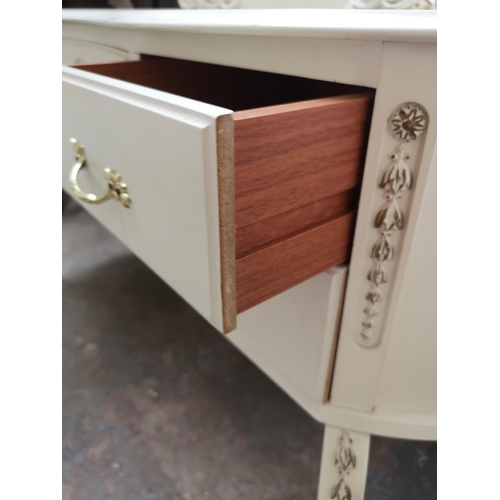 1131A - A French style white painted kidney shaped dressing table with five drawers and upper three section ... 