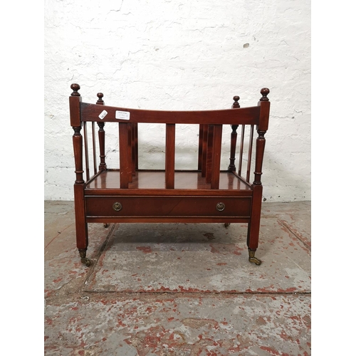 1141A - A 19th century style mahogany three division Canterbury magazine rack with brass casters and single ... 