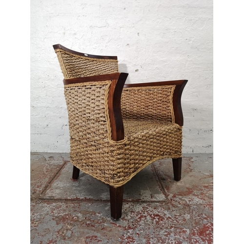 1155A - A modern hardwood and wicker armchair - approx. 90cm high x 62cm wide x 59cm deep