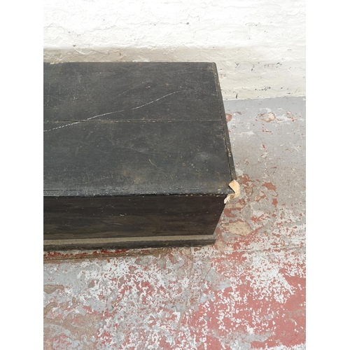 1156 - A Victorian black painted pine blanket box - approx. 48cm high x 114cm wide x 53cm deep