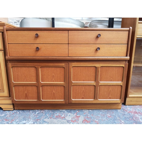 1158 - A Parker Knoll teak sideboard with four drawers and two lower cupboard doors - approx. 76cm high x 1... 