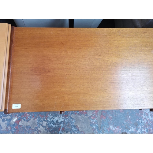 1158 - A Parker Knoll teak sideboard with four drawers and two lower cupboard doors - approx. 76cm high x 1... 