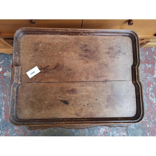 1158A - Two items, one early 20th century oak twin handled tray - approx. 56cm x 42cm and one Edwardian maho... 