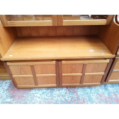 1160 - A Parker Knoll teak display cabinet with two upper glazed doors and two lower cupboard doors - appro... 