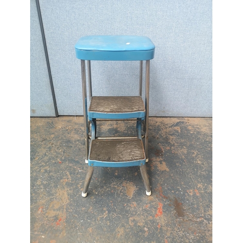 1166A - A vintage Prestige blue vinyl and chrome step stool - approx. 62cm high