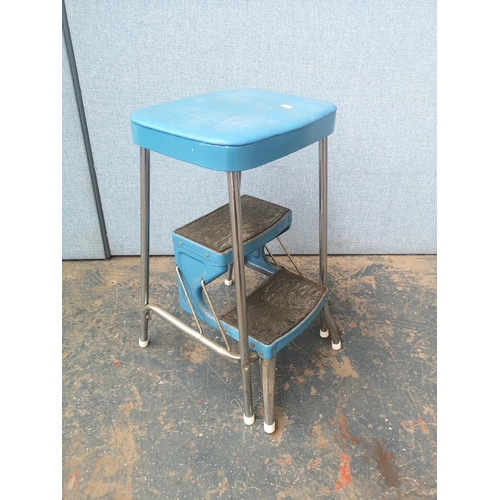 1166A - A vintage Prestige blue vinyl and chrome step stool - approx. 62cm high