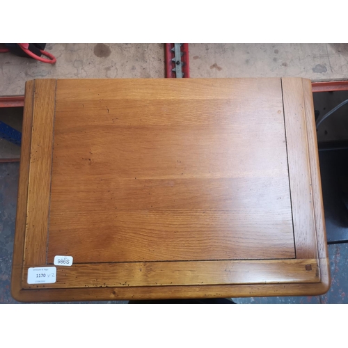 1170 - Two pieces of modern solid oak furniture, one bedside cabinet - approx. 76cm high x 46cm wide x 33cm... 